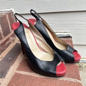 Loubs black leather peep toe pumps in size 38 EU